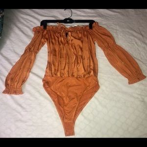 Orange off the shoulder bodysuit